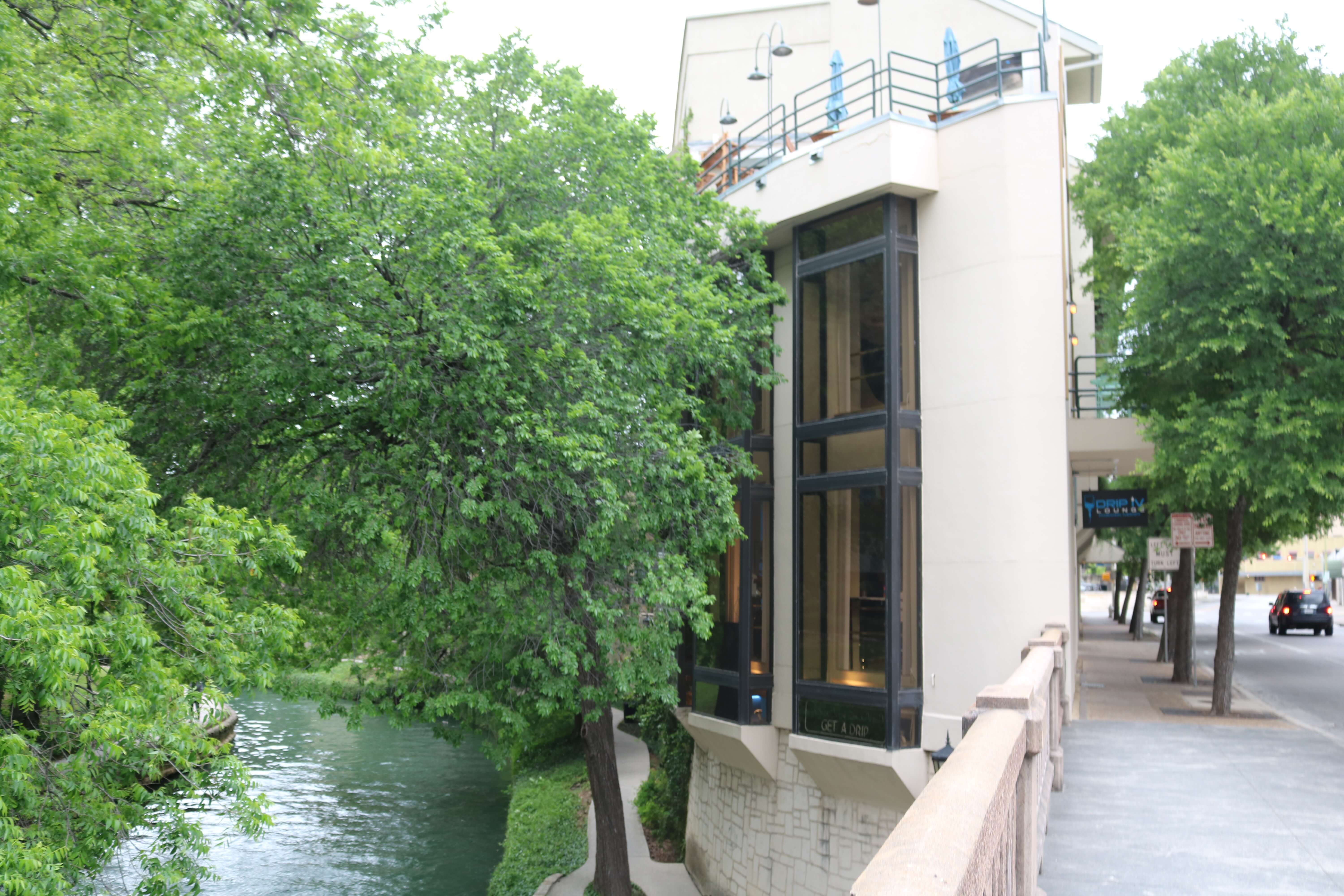 Photo of Drip IV from Street Level Cloudy Day - Drip IV San Antonio Riverwalk